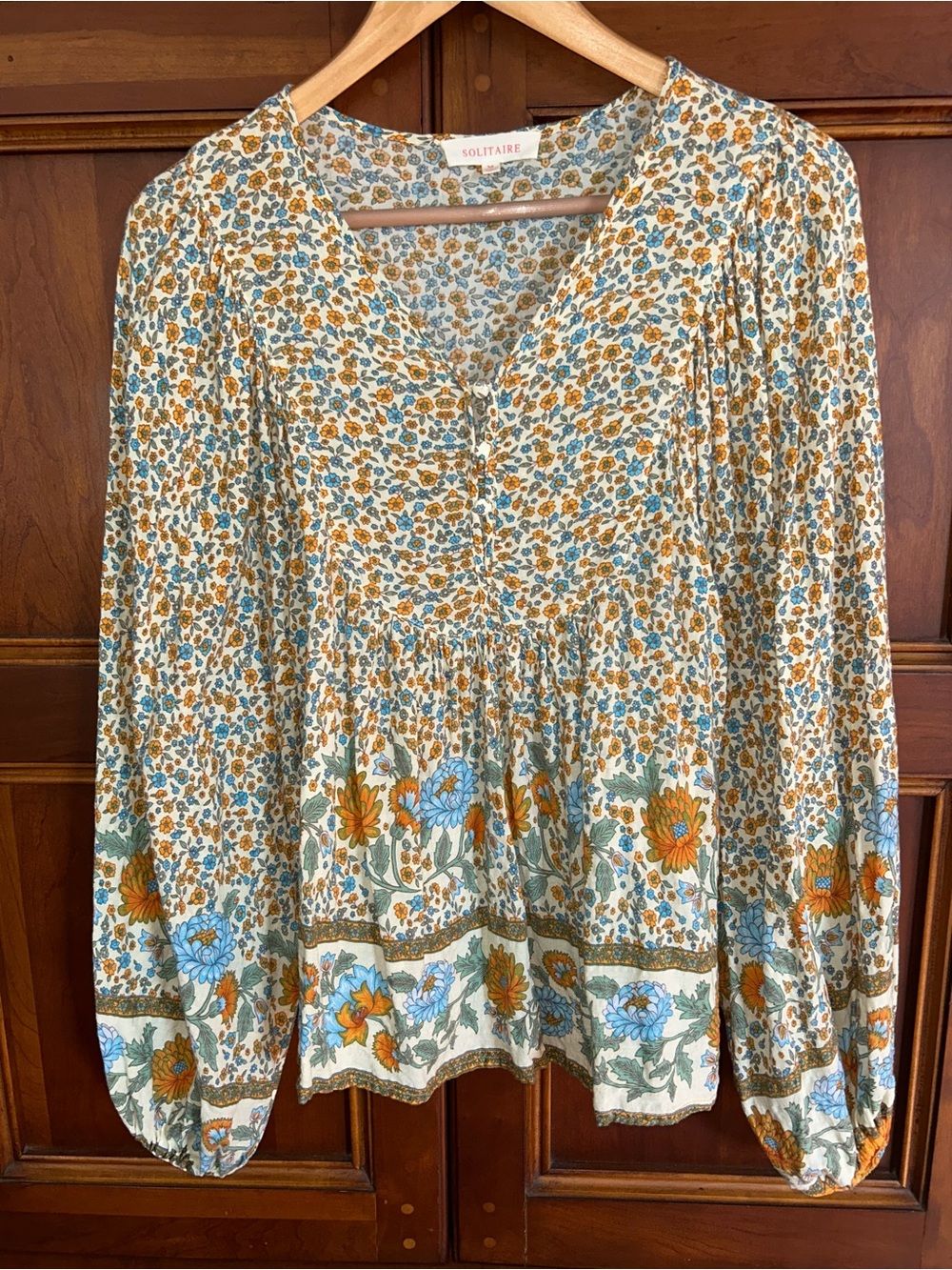 Solitaire Boho Floral Tunic Top in Cream, Blue & Mustard
Size Medium